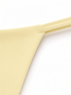 Butter Yellow detail view - side string junction