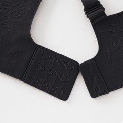 Black detail view - back hook-and-eye closure and strap