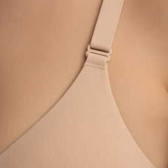 Nude detail view - cup edge and adjustable strap