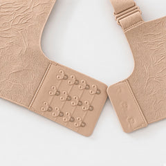 Nude detail view - back hook-and-eye closure and strap