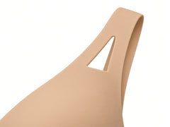 Nude detail view - cup edge and cutout strap
