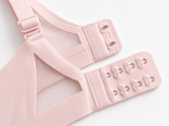 Pink detail view - back hook-and-eye closure and adjustable strap