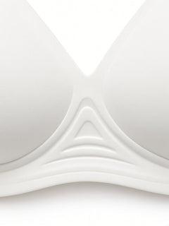 White detail view - mesh neckline and curved undercup detailing